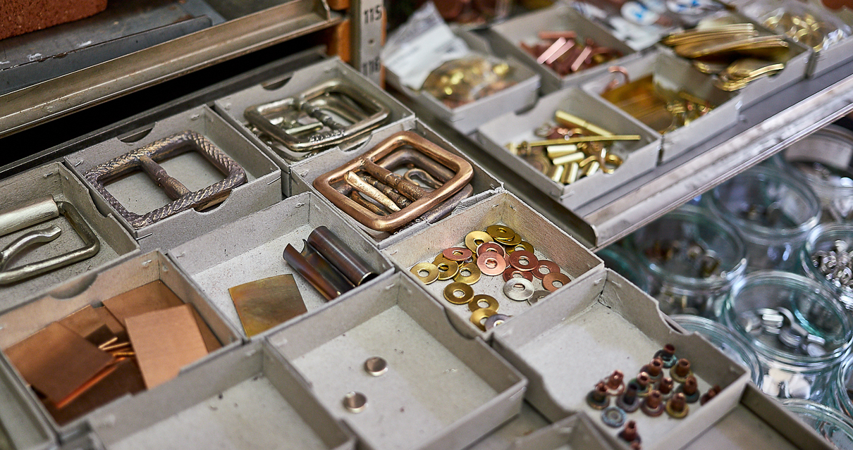castings of belt buckles by the 877 workshop