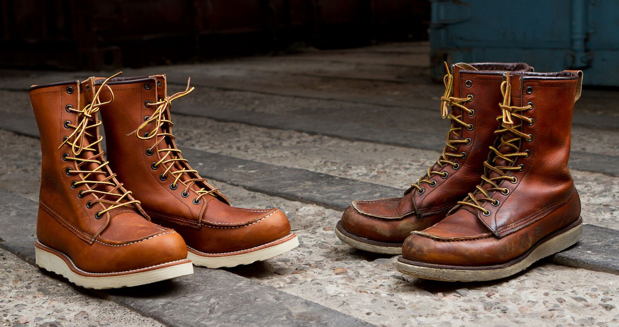 A brand new pair of Red Wing Shoes Irish Setter 877 boots sitting next to a well worn par of 877 boots