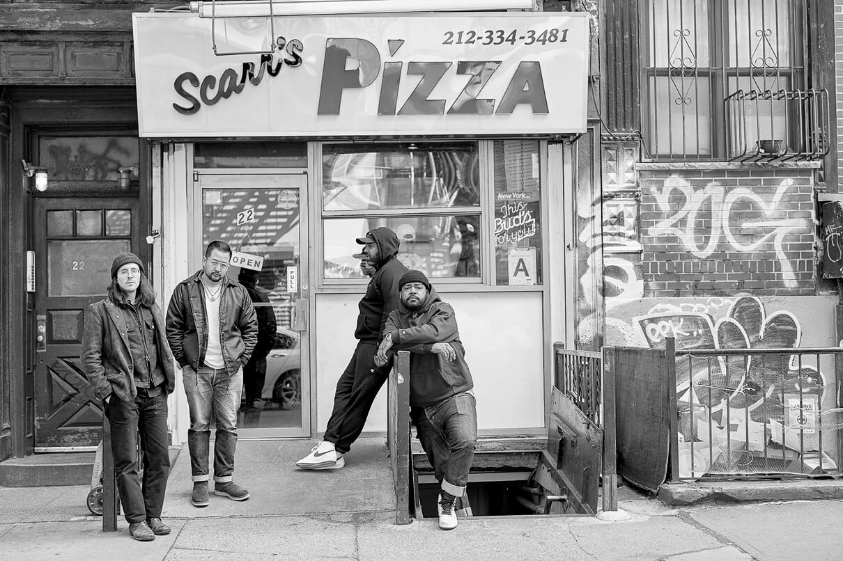 Andrew and Wesley from 3sixteen hanging out in front of Scarr pizza restaurant in New York