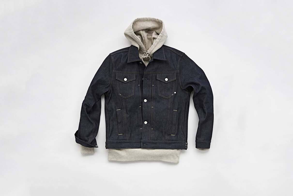 Tenue. Fonda Midway denim jacket with a grey hoodie flat lay