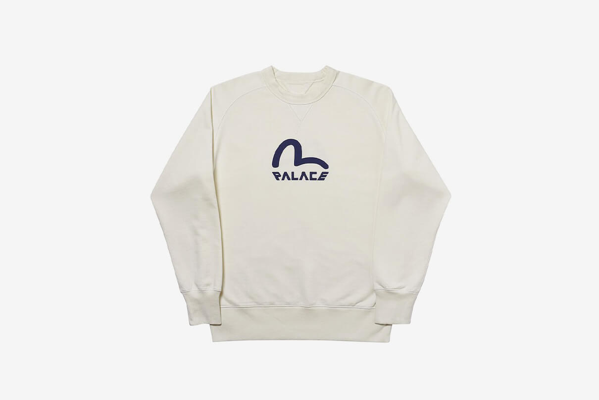 Sweatshirt from the Palace times Evisu Collaboration in cream with a blue logo shown from the front