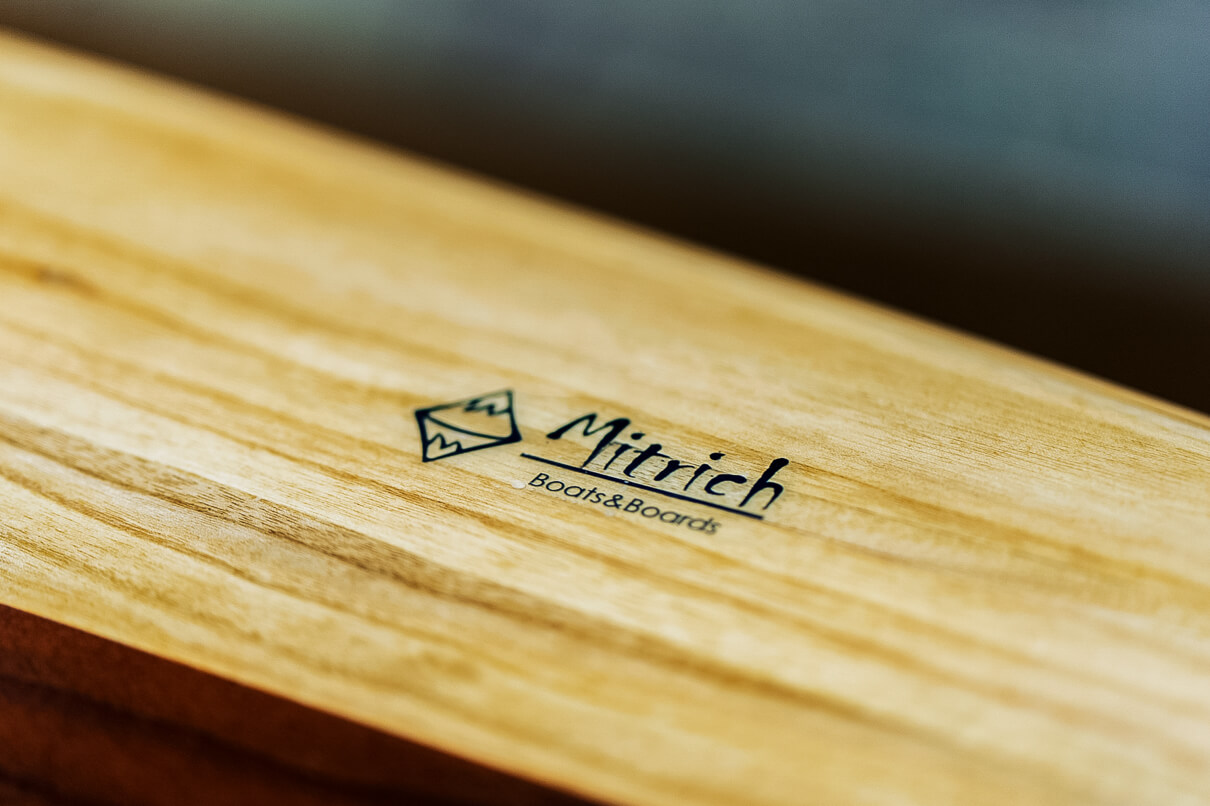 A Mitrich paddleboard close up of the logo.