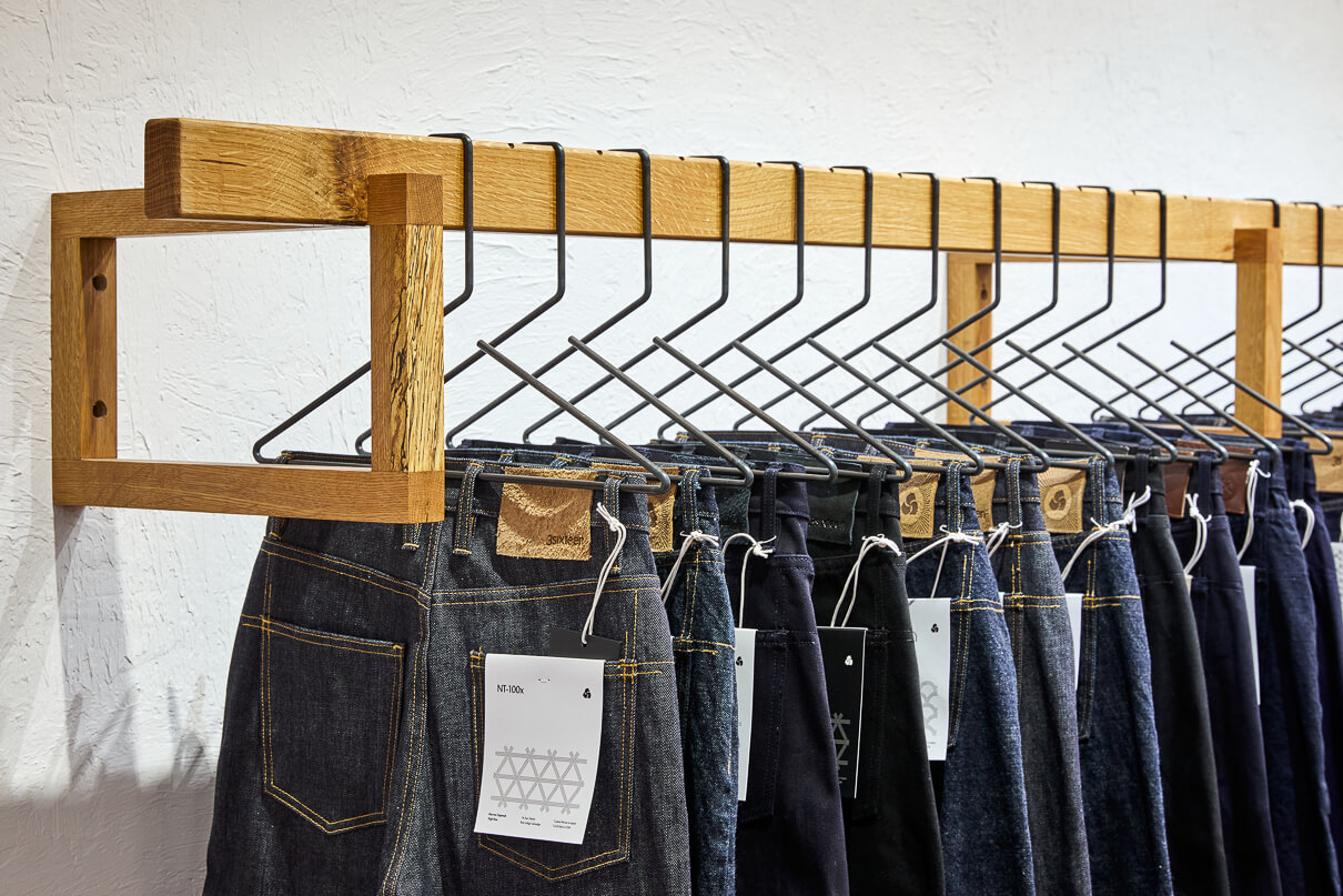 3sixteen New York Flagship store close up for jeans hanging on a rail