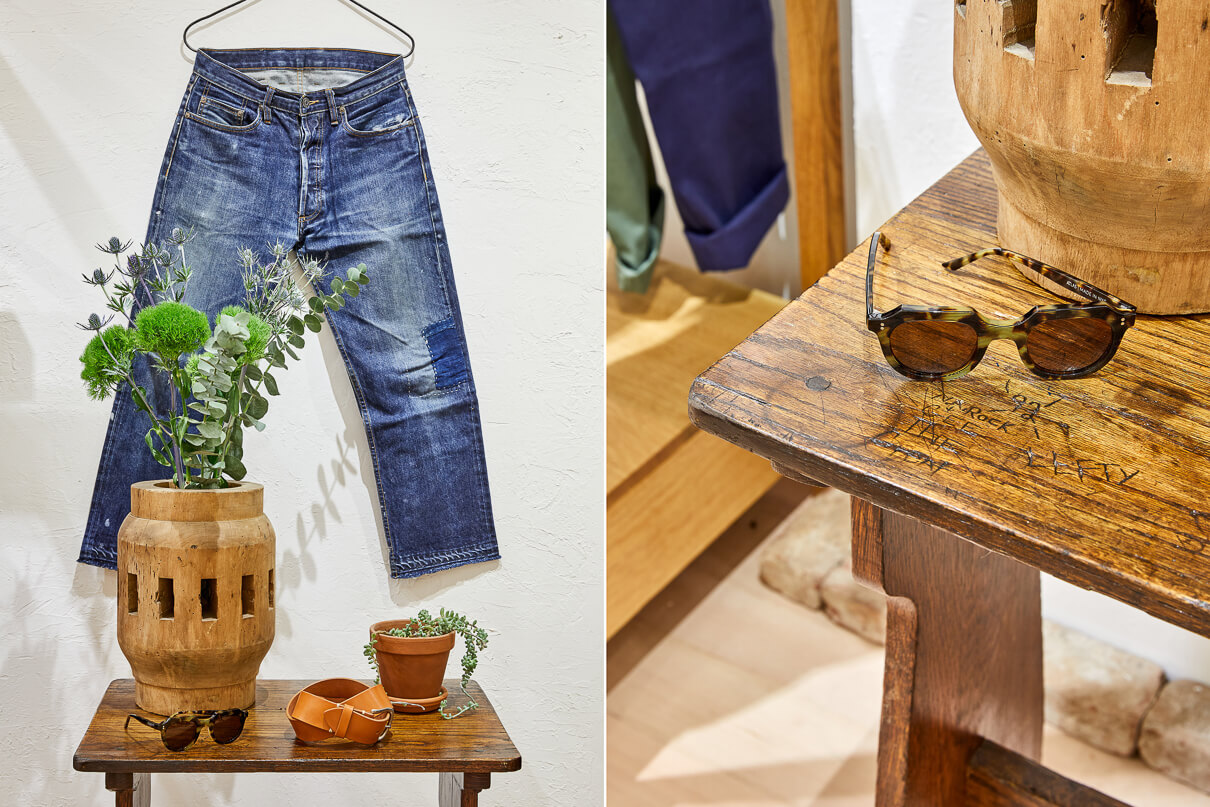3sixteen New York Flagship store a worn pair of jeans and a pair of sunglasses